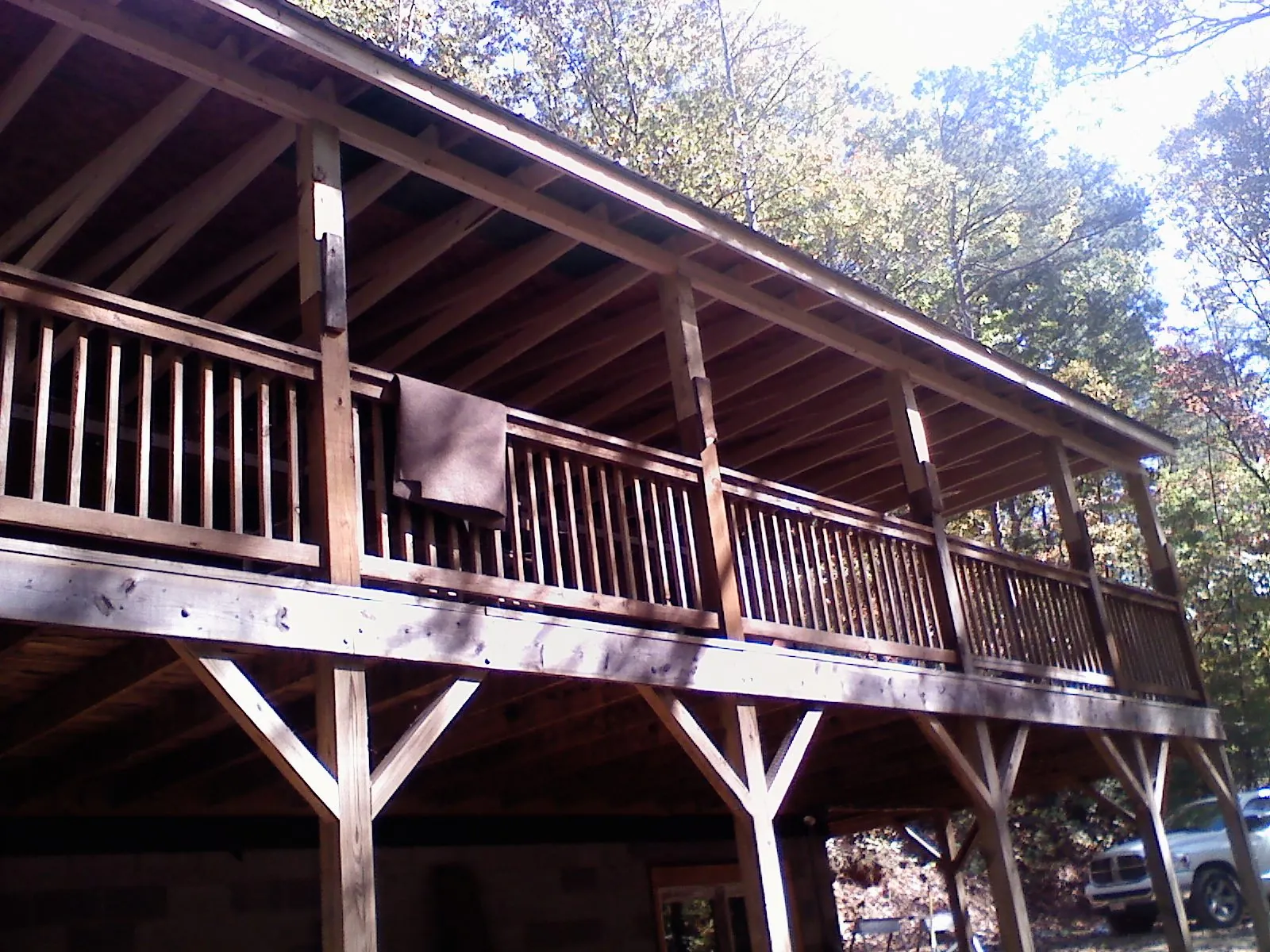 Timber framing under a new elevated porch and deck — Roof Leak Repair in Pacific City by Roofing Brothers